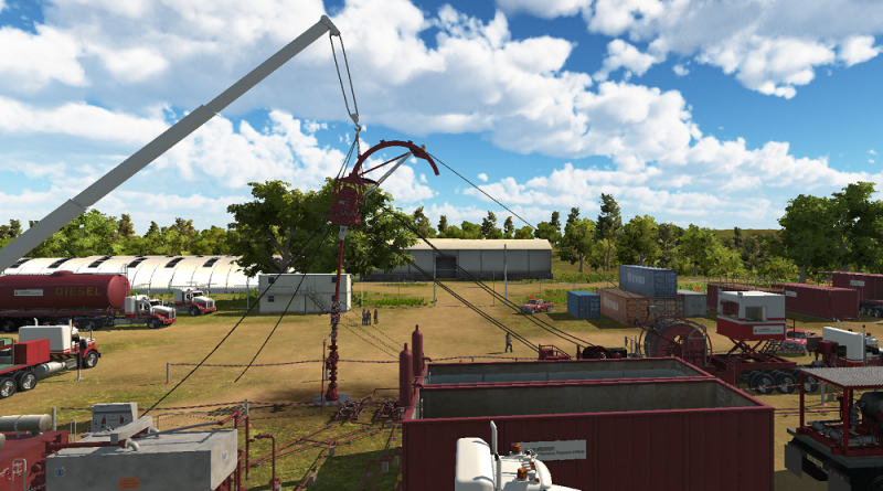 An industrial site with large machinery and cranes, various equipment, and trucks. Green trees and partly cloudy sky in the background. Several people are standing in the site area.