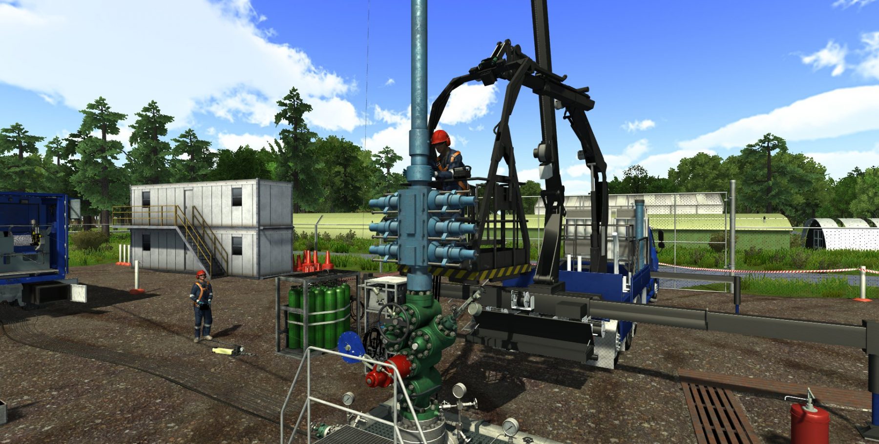 Workers in safety gear operate heavy machinery and equipment at an outdoor industrial site on a clear day, with temporary buildings and greenery in the background.