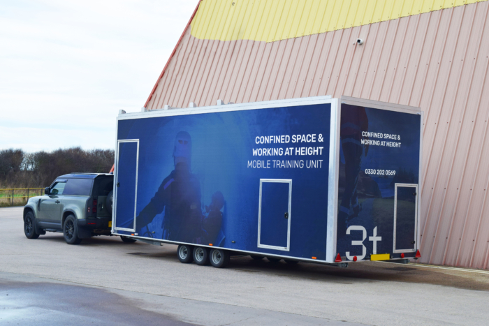 3t's mobile training unit attached to a car.